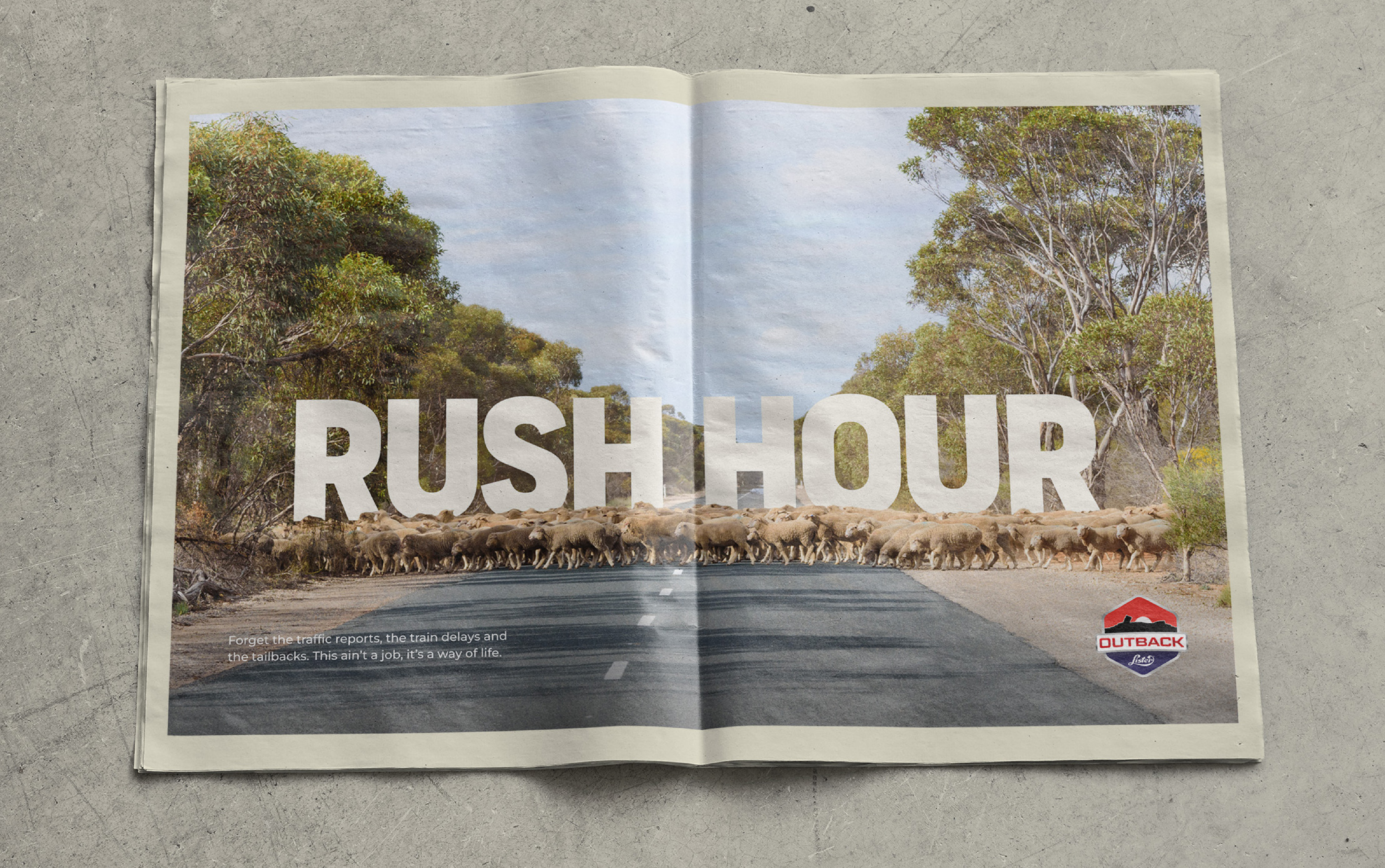 A double-page newspaper ad for Lister Shearing with the headline'Rush Hour', advertising the Outback handpiece. Designed by Mighty, brand agency