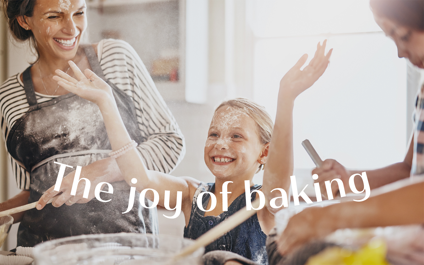 A young family baking with the tagline"The joy of baking" - campaign developed by Mighty, brand agency